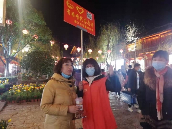 这个春节，丽江市文旅市场井然有序，离不开这群志愿者！ (4).jpg