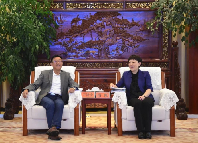 丽江市与华为技术有限公司举行座谈会.jpg