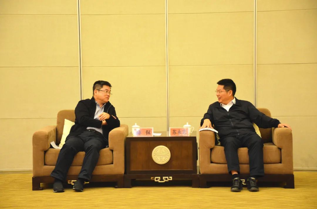 苏永忠会见上海杨浦区区长薛侃一行