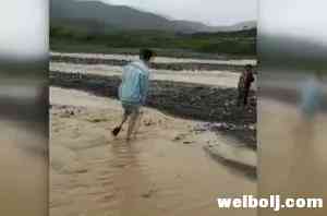 点赞！积水围困小女孩，暖心小哥背其淌水过河！