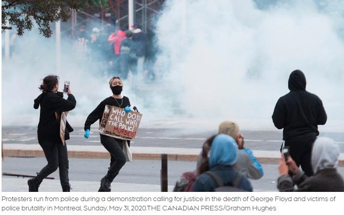 加拿大暴动开始 万人包围警局 商场遭洗劫 催泪弹连续发射.jpg