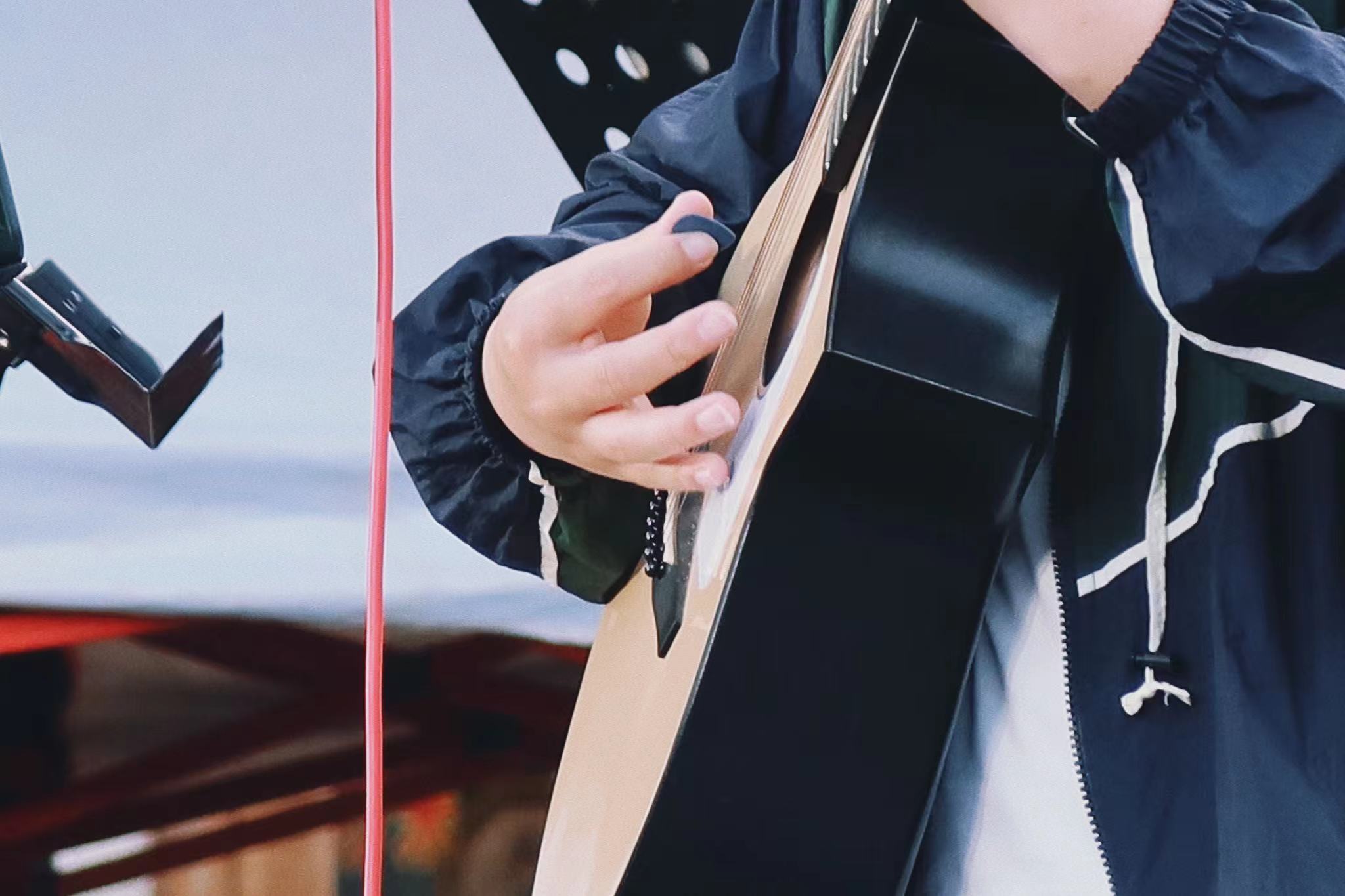 丽江古城民谣广场四方街开唱 (7).jpg