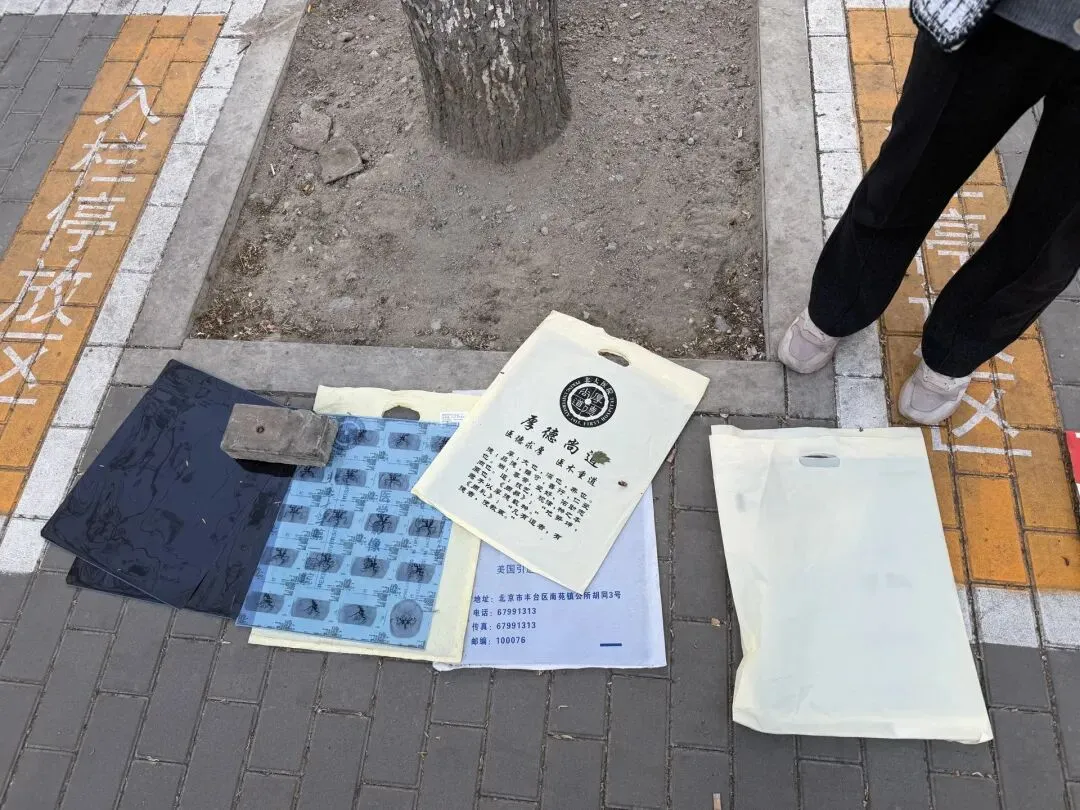 1.5元一张回收废旧CT片，转手提炼白银！律师：超3吨可构成污染环境罪